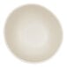 A round ivory melamine soup bowl.