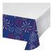 A blue and red fireworks patterned tablecloth with white Lady Liberty silhouettes.