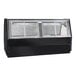 A Howard McCray black refrigerated red meat case with curved glass windows.