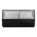 A black Howard McCray refrigerated meat case with curved glass windows.