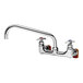 A chrome T&S wall mount faucet with two handles and a 12" swing nozzle.