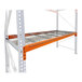 An orange heavy-duty bolted teardrop pallet rack add-on level with three wire decks for industrial shelving.