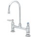 A chrome T&S deck-mounted faucet with two handles.