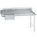 An Advance Tabco stainless steel dishtable with a sink and a drain on a counter.