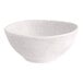 A white round melamine bowl with a speckled pattern.