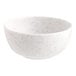 A small white round melamine ramekin with a speckled pattern.