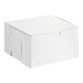 A plain white cardboard bakery box with a closed lid.
