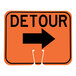 An orange and black single-sided 'Detour' cone sign with a right arrow.