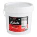 A white bucket with a red and black label for Cleveland Kitchen Classic Kimchi.