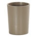 A taupe round resin crock with a lid.