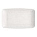 A white rectangular melamine platter with a speckled pattern.