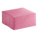 A pink Baker's Lane bakery box with a lid.