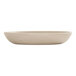 A matte taupe melamine pasta bowl with a white interior.