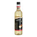 A close up of a bottle of DaVinci Gourmet Classic Hazelnut Flavoring Syrup with a lid.