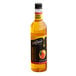 A close up of a DaVinci Gourmet Classic Mango Flavoring syrup bottle.