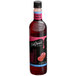 A close up of a DaVinci Gourmet Sugar-Free Raspberry Flavoring Syrup bottle with a pink label.