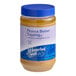 A jar of J. Hungerford Smith Peanut Butter Topping with a blue lid and label.