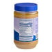 A 40-ounce plastic jar of J. Hungerford Smith peanut butter dessert or sundae topping with a blue lid.