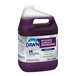 A purple Dawn Professional Kitchen Surface Degreaser bottle on a counter.