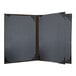 A black rectangular menu cover with brown album style corners.