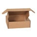 A brown Lavex cardboard mailer with an open lid.
