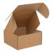 A close-up of a brown Lavex cardboard box with a lid open.