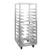 A white metal rack with shelves on wheels.