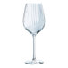 A close-up of a clear Arcoroc Serena wine glass with a curved stem and wavy design.