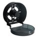 A black plastic jumbo toilet tissue dispenser with a translucent cover and serrated edge for cutting tissue.