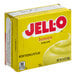 A yellow box of JELL-O Instant Lemon Pudding mix on a counter.
