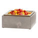 A Cal-Mil gray wood box filled with fruit on a counter.