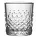 A clear 8 oz. rocks glass with a textured diamond pattern on the lower half.