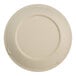 A close-up of a World Centric compostable fiber lid on a white plate.