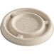 A compostable fiber lid designed for a 2 oz. portion cup.