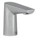 A Bobrick polished chrome automatic deck-mount faucet with a single handle.