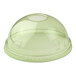A green compostable plastic dome lid with a straw hole designed for cold cups.