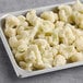 A tray of frozen cauliflower florets.