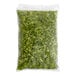A sealed plastic bag containing individually quick frozen diced green peppers.