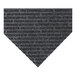 A dark gray entranceway carpet tile with a broken diagonal line pattern.