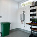 A Rinnai liquid propane tankless water heater on a wall.
