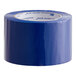 A roll of blue acrylic carton sealing tape.