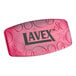 A pink Lavex toilet bowl clip with a green apple scent.