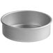 A silver round straight-sided cake pan.