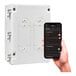 A hand using the Bromic Heating Affinity Smart-Heat On / Off Controller with a cell phone.