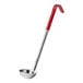 A stainless steel ladle with a red coated handle.
