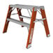 A two-step non-conductive fiberglass and aluminum workstand or sawhorse.