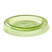 A green Eco-Products compostable plastic lid on a table with green Eco-Products portion cups.