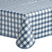 A navy and white gingham-patterned vinyl table cover with a flannel back.