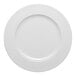 A white round porcelain plate with an embossed wide rim.