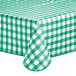 A green and white gingham-patterned vinyl table cover with a flannel back.